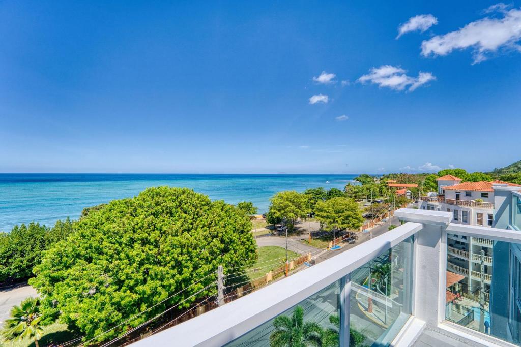 Wide Caribbean ocean view from the private penthouse terrace