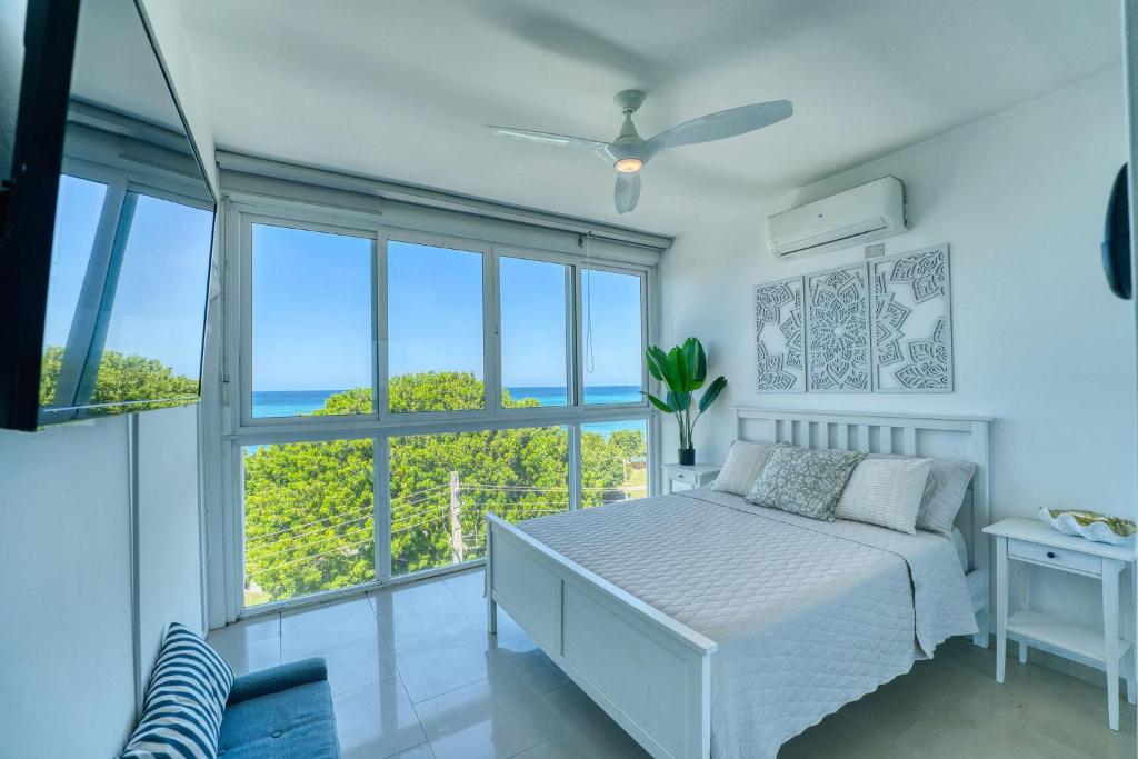 Ocean-view king suite with a dedicated workspace